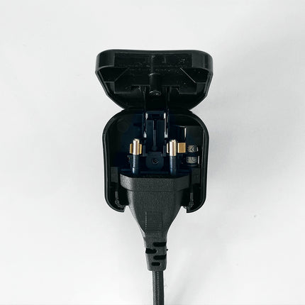Black electrical plug on a white background