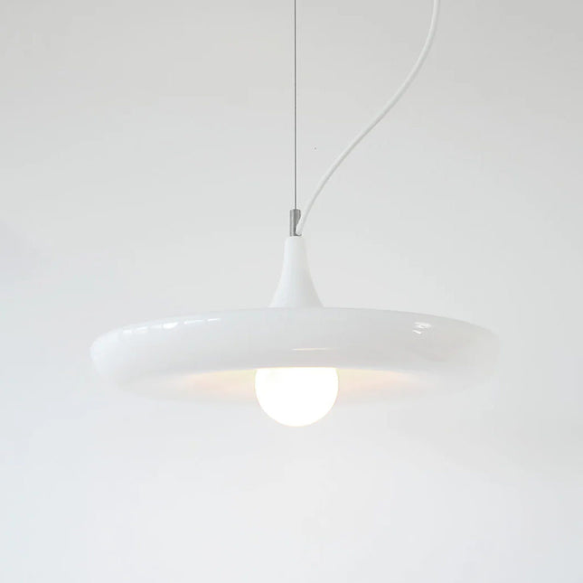 White pendant light against a white background