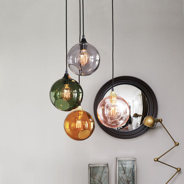 coloured glass globe lights hanging from ceiling