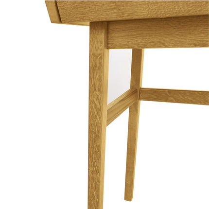 Close-up of carteret desk wooden leg with a white background