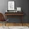 Vintage wooden desk with chair against a grey wall with a framed map of New York.