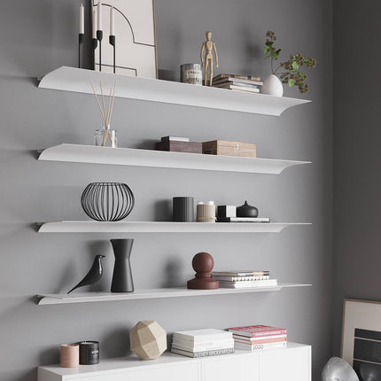 Metal white shelves against a grey wall with decorative items.