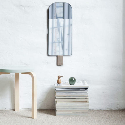 ice cream mirror hanging on a wall