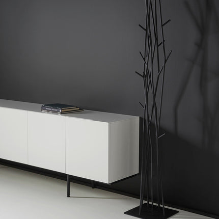 black metal coat stand in a modern minimalist room 